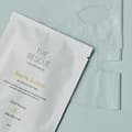 Snow Lotus ansiktsmask från Oslo Skin Lab med återfuktande biocellulosamask.